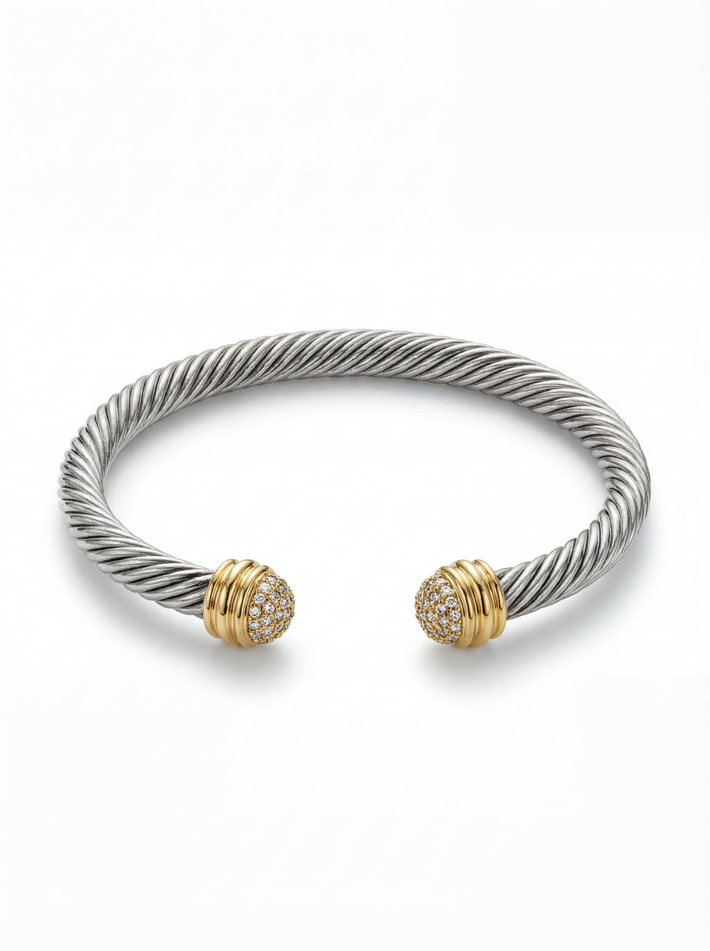 Silver bracelet with gold accents on a white background
