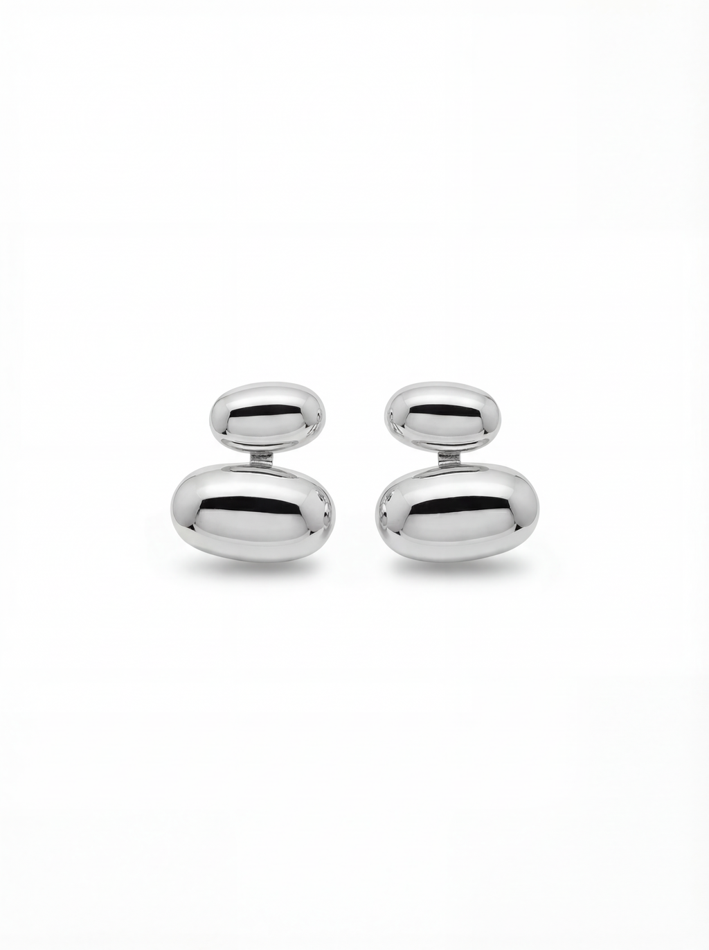 Pair of silver oval-shaped cufflinks on a white background