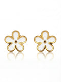 Pair of flower-shaped earrings with gold frames and white centers on a white background