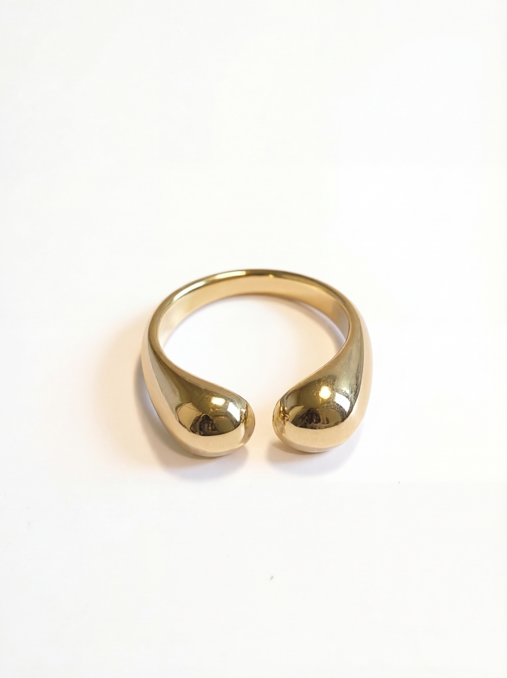 Gold ring on a white background