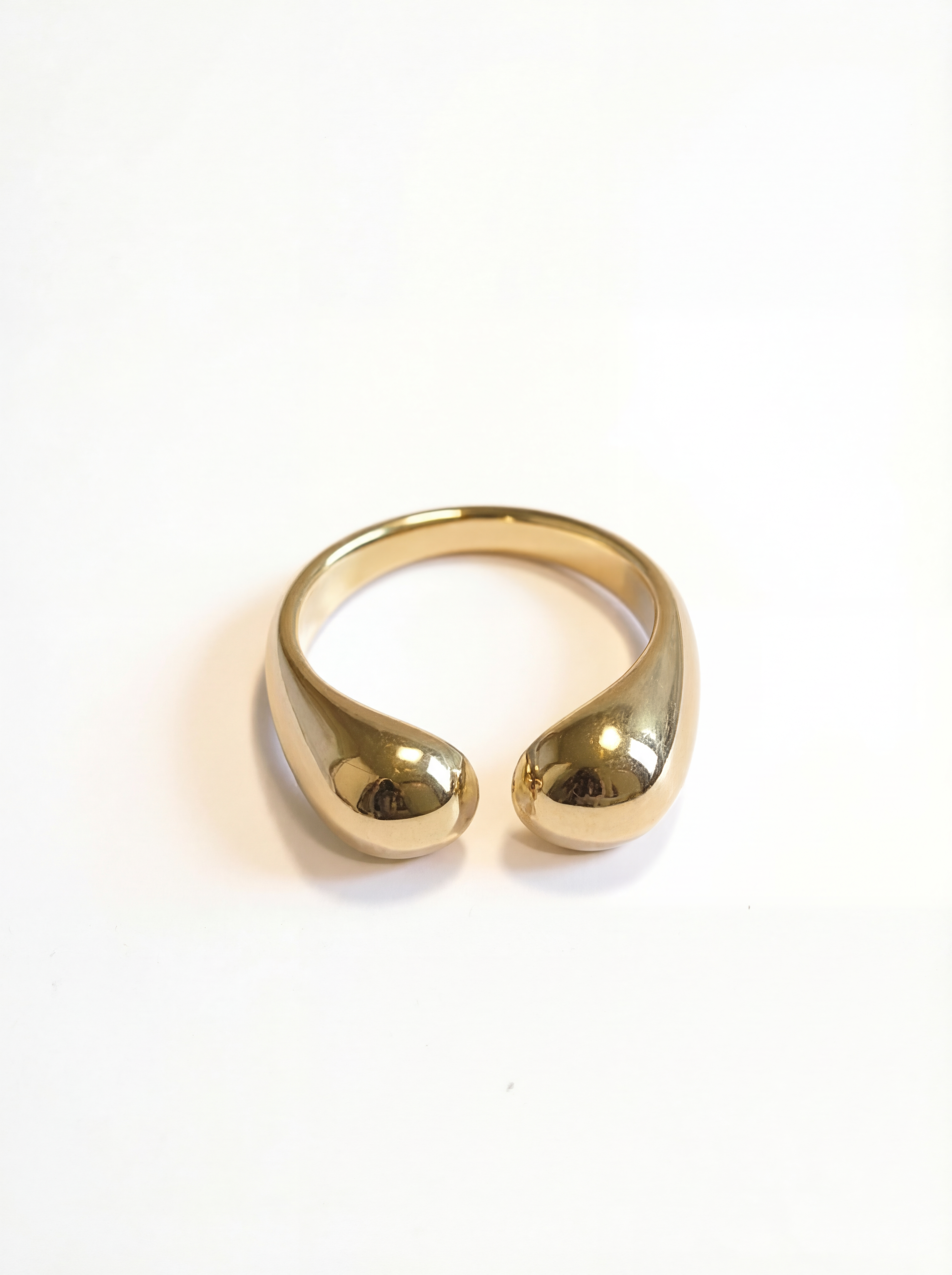 Gold ring on a white background