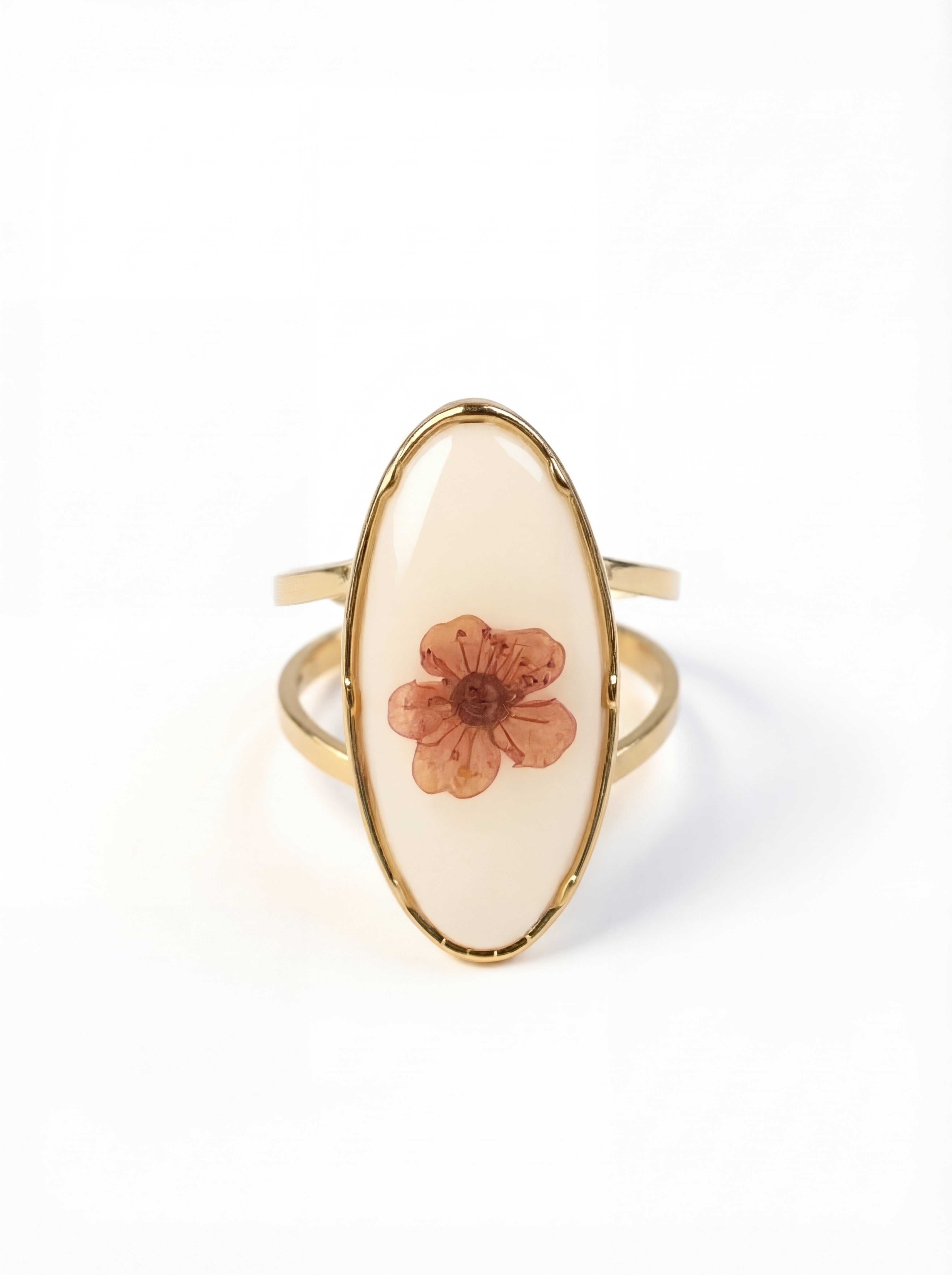 Ring with a floral design on a white background