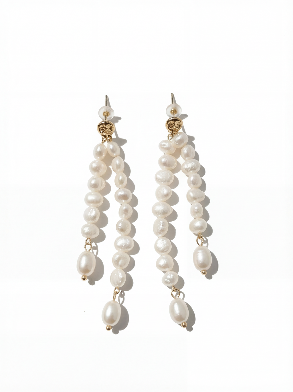 Pair of pearl earrings on a white background