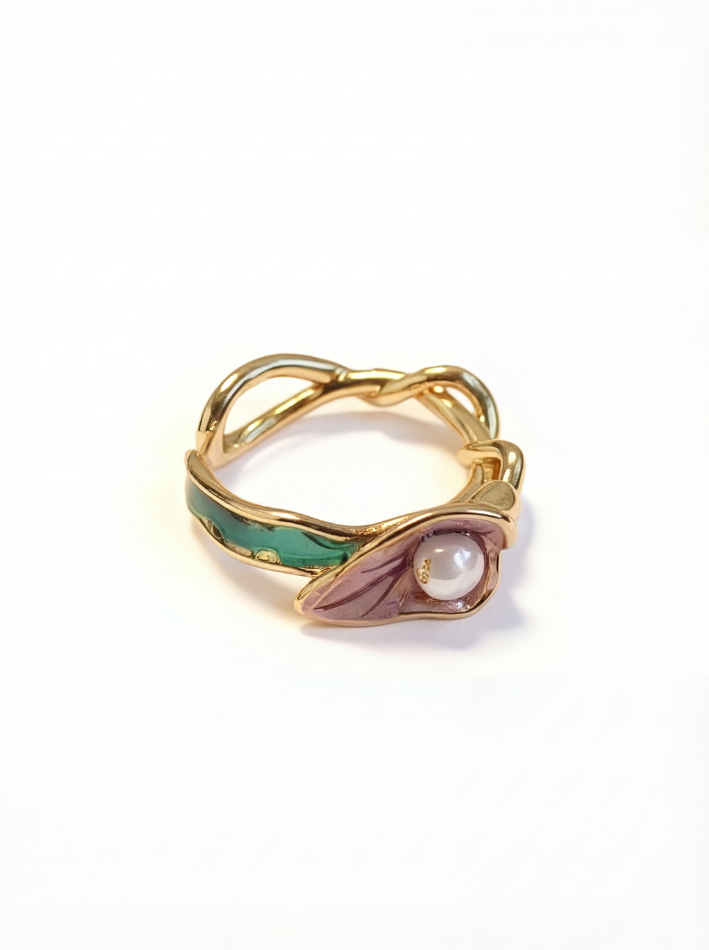 Gold ring with green and pink gemstones on a white background
