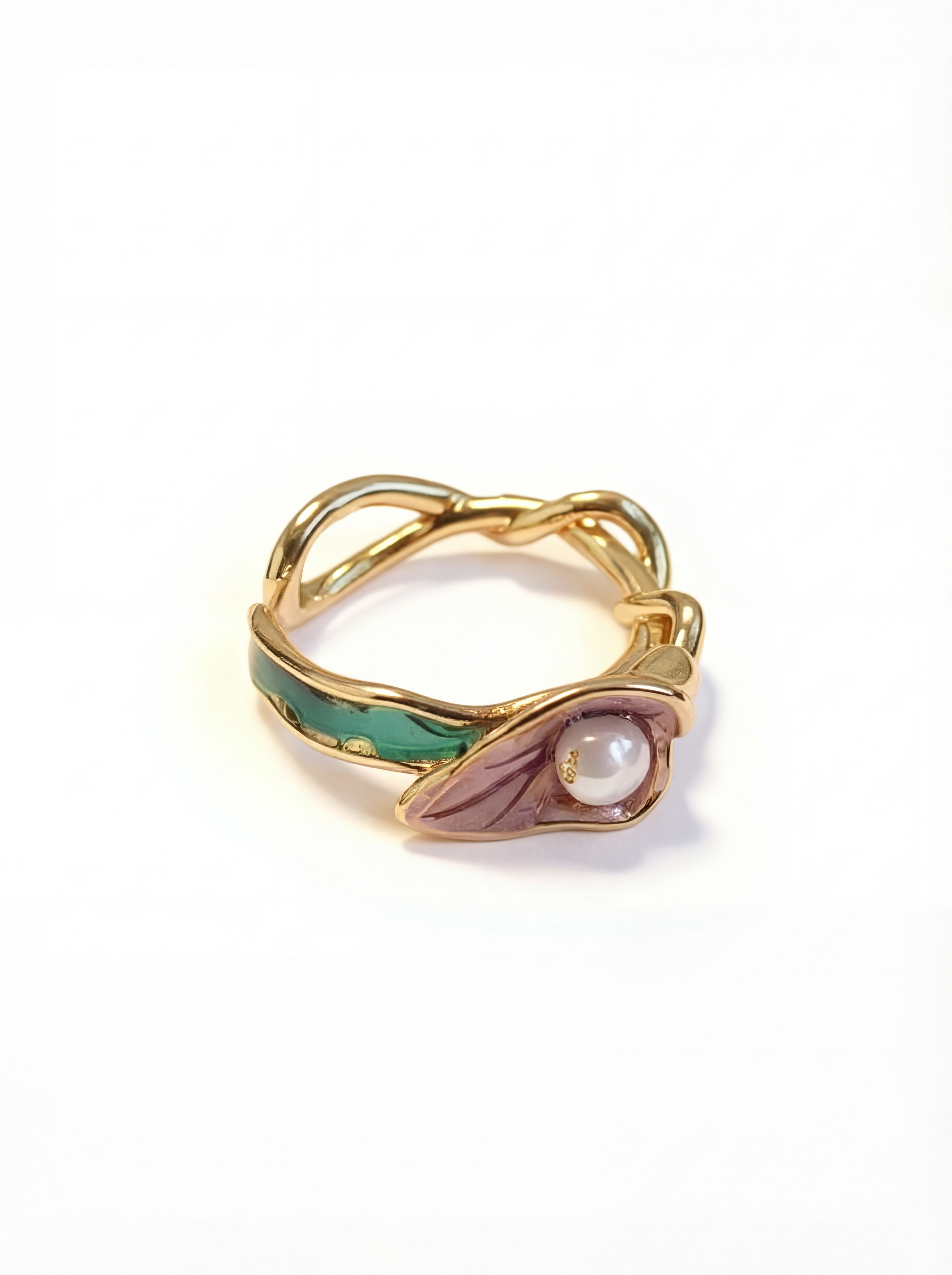 Gold ring with green and pink gemstones on a white background