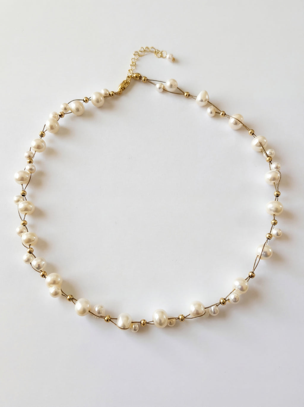 Pearl necklace on a white background