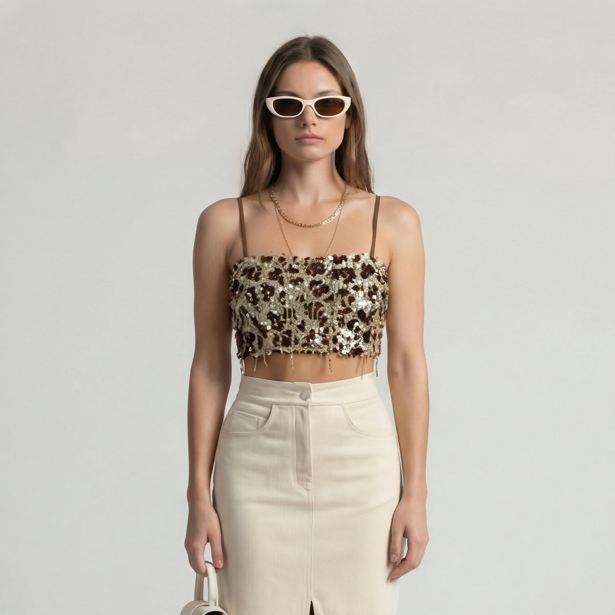 Schmale, kurze Pailletten-Bluse mit Leopardenmuster in Gold